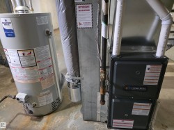 Water heater and furnace with exposed utility piping - 