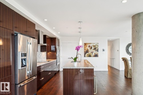 #1201 11969 Jasper Av Nw, Edmonton, AB - Indoor Photo Showing Kitchen With Upgraded Kitchen