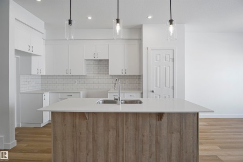 583 Ashgrove Circle, Leduc, AB - Indoor Photo Showing Kitchen With Double Sink With Upgraded Kitchen