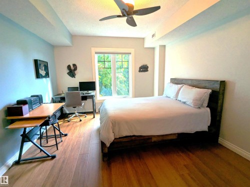 H-U-G-E Primary bedroom! - #302 9811 96A St Nw, Edmonton, AB - Indoor Photo Showing Bedroom