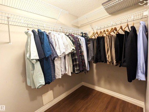 Large walk in closet. Plenty of storage space - #302 9811 96A St Nw, Edmonton, AB - Indoor With Storage