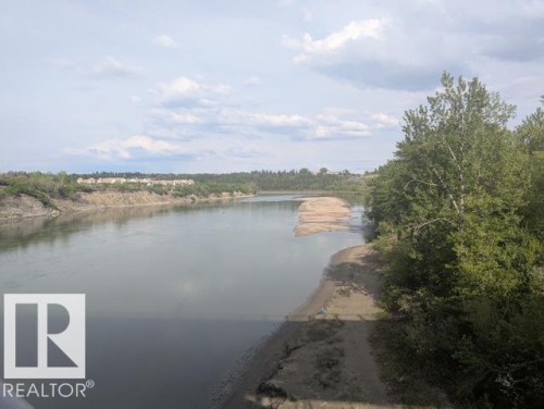 steps away from the river valley trails - #302 9811 96A St Nw, Edmonton, AB - Outdoor With Body Of Water With View