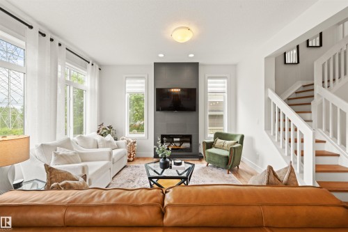 3837 Robins Crescent Nw, Edmonton, AB - Indoor Photo Showing Living Room With Fireplace