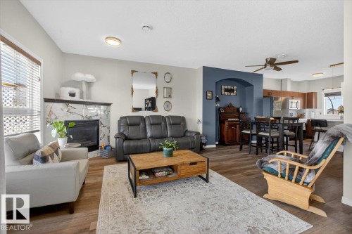#76 3010 33 Av Nw, Edmonton, AB - Indoor Photo Showing Living Room With Fireplace