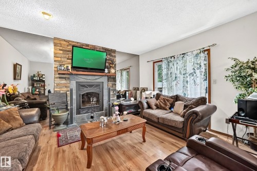 6 Atkinson Place, St. Albert, AB - Indoor Photo Showing Living Room With Fireplace