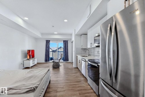 #301 864 Secord Bv Nw, Edmonton, AB - Indoor Photo Showing Kitchen With Stainless Steel Kitchen With Upgraded Kitchen