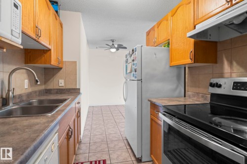 #204 2545 116 St Nw, Edmonton, AB - Indoor Photo Showing Kitchen With Double Sink