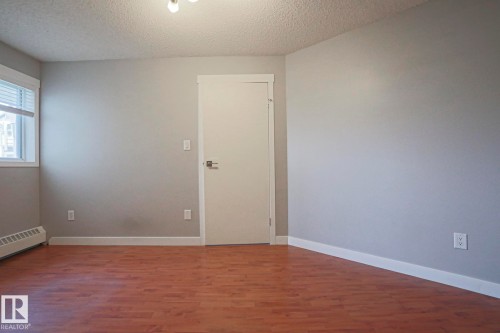 #208 6710 158 Av Nw, Edmonton, AB - Indoor Photo Showing Other Room
