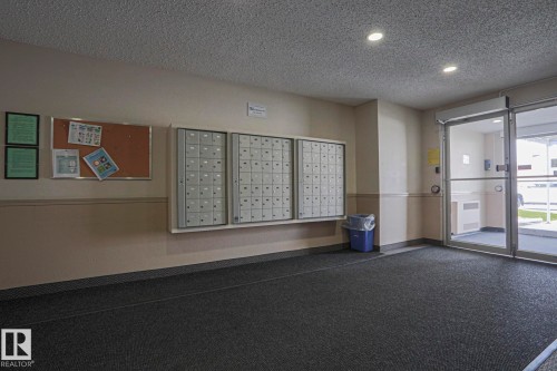 #208 6710 158 Av Nw, Edmonton, AB - Indoor Photo Showing Other Room