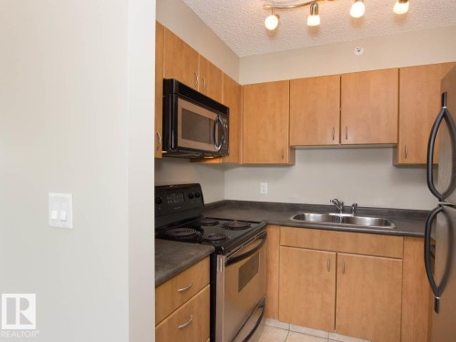 #1806 10303 105 St Nw, Edmonton, AB - Indoor Photo Showing Kitchen With Double Sink