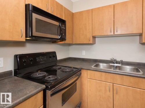 #1806 10303 105 St Nw, Edmonton, AB - Indoor Photo Showing Kitchen With Double Sink