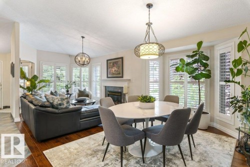 2 Enderby Crescent, St. Albert, AB - Indoor Photo Showing Dining Room With Fireplace