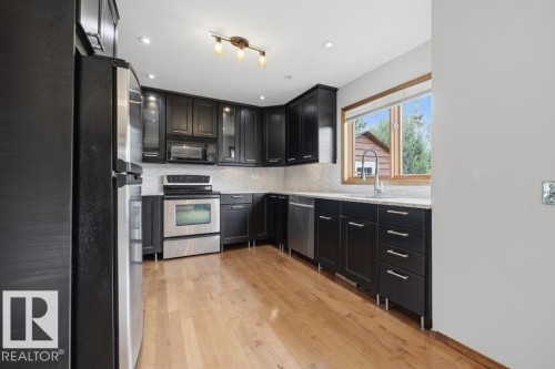 4140 147 Street Nw, Edmonton, AB - Indoor Photo Showing Kitchen With Upgraded Kitchen