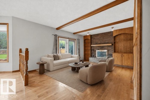 Photo Virtually Staged. - 4140 147 Street Nw, Edmonton, AB - Indoor With Fireplace
