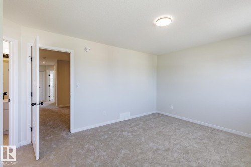 99 Silverstone Drive, Stony Plain, AB - Indoor Photo Showing Other Room