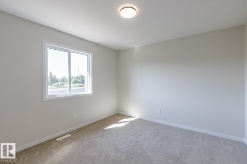 99 Silverstone Drive, Stony Plain, AB - Indoor Photo Showing Other Room
