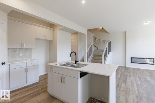 99 Silverstone Drive, Stony Plain, AB - Indoor Photo Showing Kitchen With Double Sink