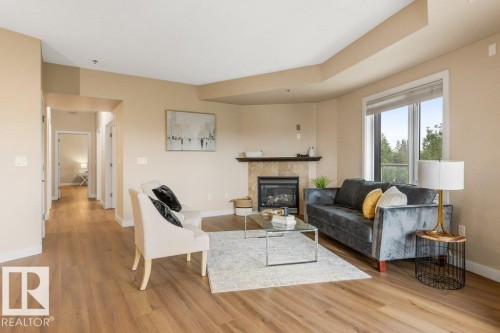 #205 35 Sturgeon Rd, St. Albert, AB - Indoor Photo Showing Living Room With Fireplace