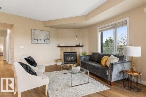 #205 35 Sturgeon Rd, St. Albert, AB - Indoor Photo Showing Living Room With Fireplace