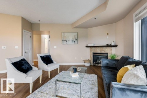 #205 35 Sturgeon Rd, St. Albert, AB - Indoor Photo Showing Living Room With Fireplace