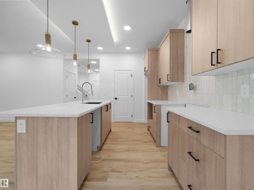 8247 Kiriak Loop Sw, Edmonton, AB - Indoor Photo Showing Kitchen With Upgraded Kitchen