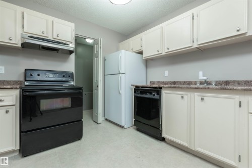#23 14620 26 St Nw, Edmonton, AB - Indoor Photo Showing Kitchen