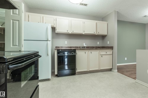 #23 14620 26 St Nw, Edmonton, AB - Indoor Photo Showing Kitchen
