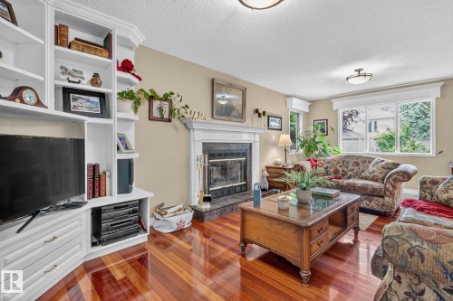 3108 36B Avenue Nw, Edmonton, AB - Indoor Photo Showing Living Room With Fireplace