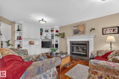 3108 36B Avenue Nw, Edmonton, AB - Indoor Photo Showing Living Room With Fireplace