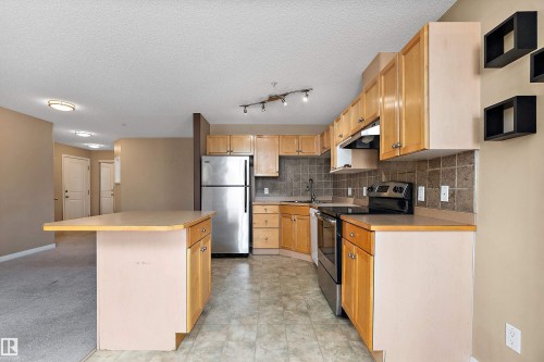 #325 11325 83 St Nw, Edmonton, AB - Indoor Photo Showing Kitchen