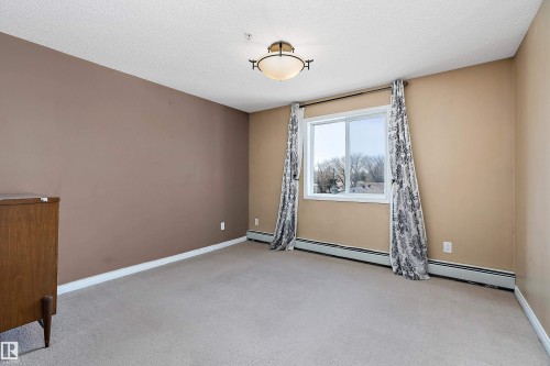#325 11325 83 St Nw, Edmonton, AB - Indoor Photo Showing Other Room