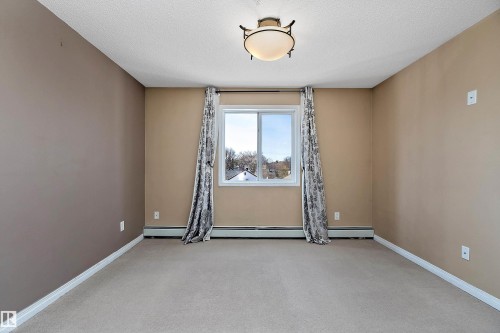 #325 11325 83 St Nw, Edmonton, AB - Indoor Photo Showing Other Room