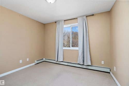 #325 11325 83 St Nw, Edmonton, AB - Indoor Photo Showing Other Room
