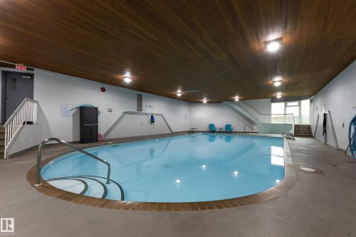 #213 5125 Riverbend Rd Nw, Edmonton, AB - Indoor Photo Showing Other Room With In Ground Pool