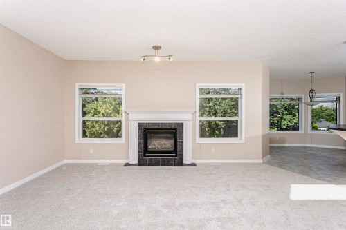 21 Alderson Close, Fort Saskatchewan, AB - Indoor Photo Showing Living Room With Fireplace