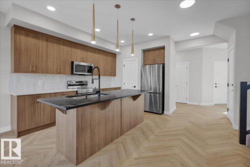 8308 Kiriak Loop Sw, Edmonton, AB - Indoor Photo Showing Kitchen With Double Sink With Upgraded Kitchen