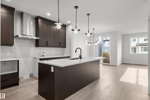 9096 Elves Loop Nw, Edmonton, AB - Indoor Photo Showing Kitchen With Upgraded Kitchen