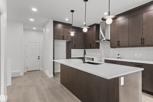 9096 Elves Loop Nw, Edmonton, AB - Indoor Photo Showing Kitchen With Upgraded Kitchen