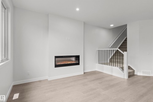 9096 Elves Loop Nw, Edmonton, AB - Indoor With Fireplace