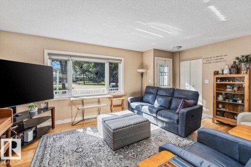 8928 92 Avenue, Fort Saskatchewan, AB - Indoor Photo Showing Living Room