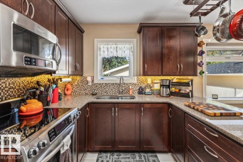 8928 92 Avenue, Fort Saskatchewan, AB - Indoor Photo Showing Kitchen With Double Sink