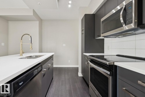 #904 10410 102 Av Nw, Edmonton, AB - Indoor Photo Showing Kitchen With Stainless Steel Kitchen With Double Sink With Upgraded Kitchen