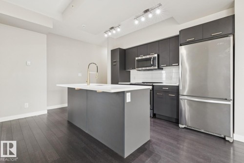 #904 10410 102 Av Nw, Edmonton, AB - Indoor Photo Showing Kitchen With Stainless Steel Kitchen With Upgraded Kitchen