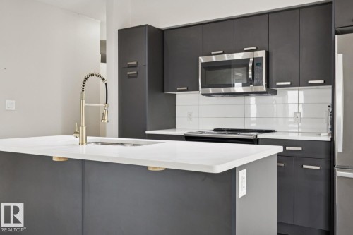 #904 10410 102 Av Nw, Edmonton, AB - Indoor Photo Showing Kitchen With Upgraded Kitchen