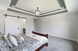 Tray ceiling with contrasting accents and crown molding - 