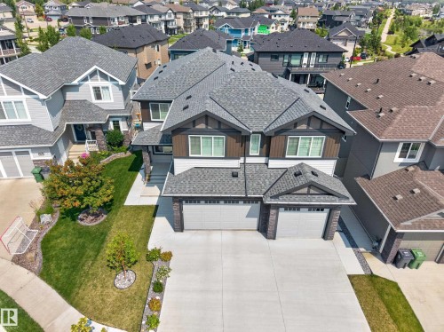 Modern two-story residence with a dual-tone facade and a prominent multi-gable roofline - 4703 41 Street, Beaumont, AB - Outdoor With Facade