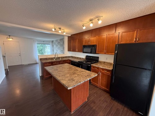 #8 3075 Trelle Cr Nw, Edmonton, AB - Indoor Photo Showing Kitchen With Double Sink