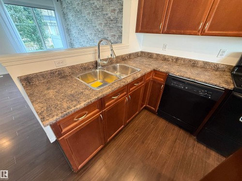 #8 3075 Trelle Cr Nw, Edmonton, AB - Indoor Photo Showing Kitchen With Double Sink