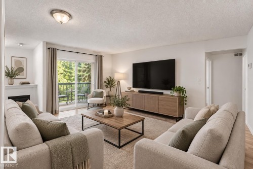 #221 279 Suder Greens Dr Nw, Edmonton, AB - Indoor Photo Showing Living Room