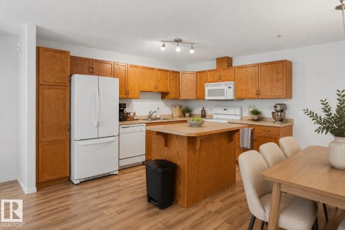 #221 279 Suder Greens Dr Nw, Edmonton, AB - Indoor Photo Showing Kitchen With Double Sink